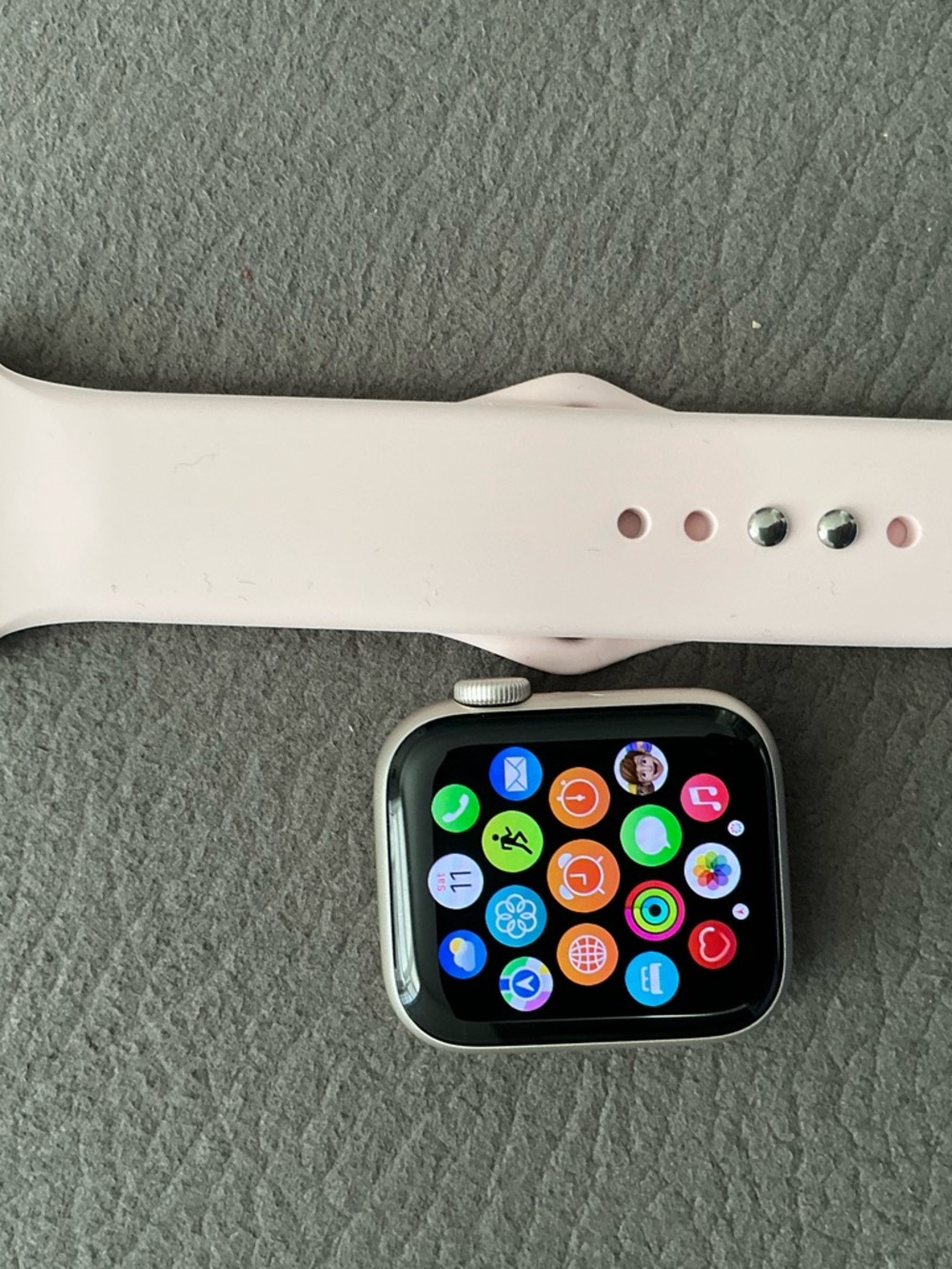 Apple Watch SE with Silver Case with Light Pink Sport Band